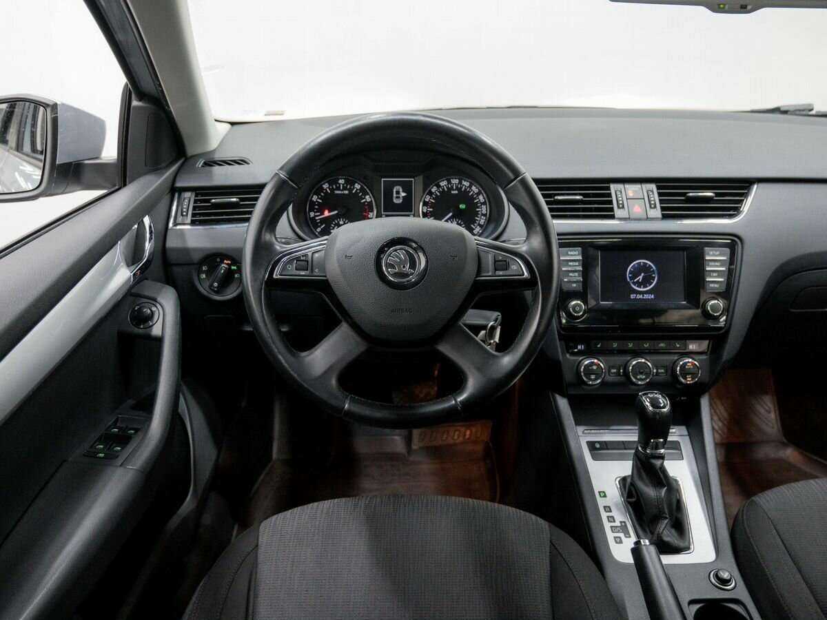 Б/У Шкода Октавия 2013 года. Фото: #11