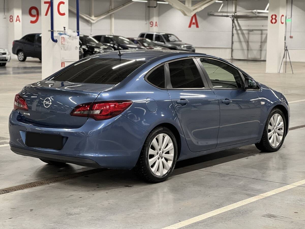Б/У Опель Астра 2013 года. Фото: #4